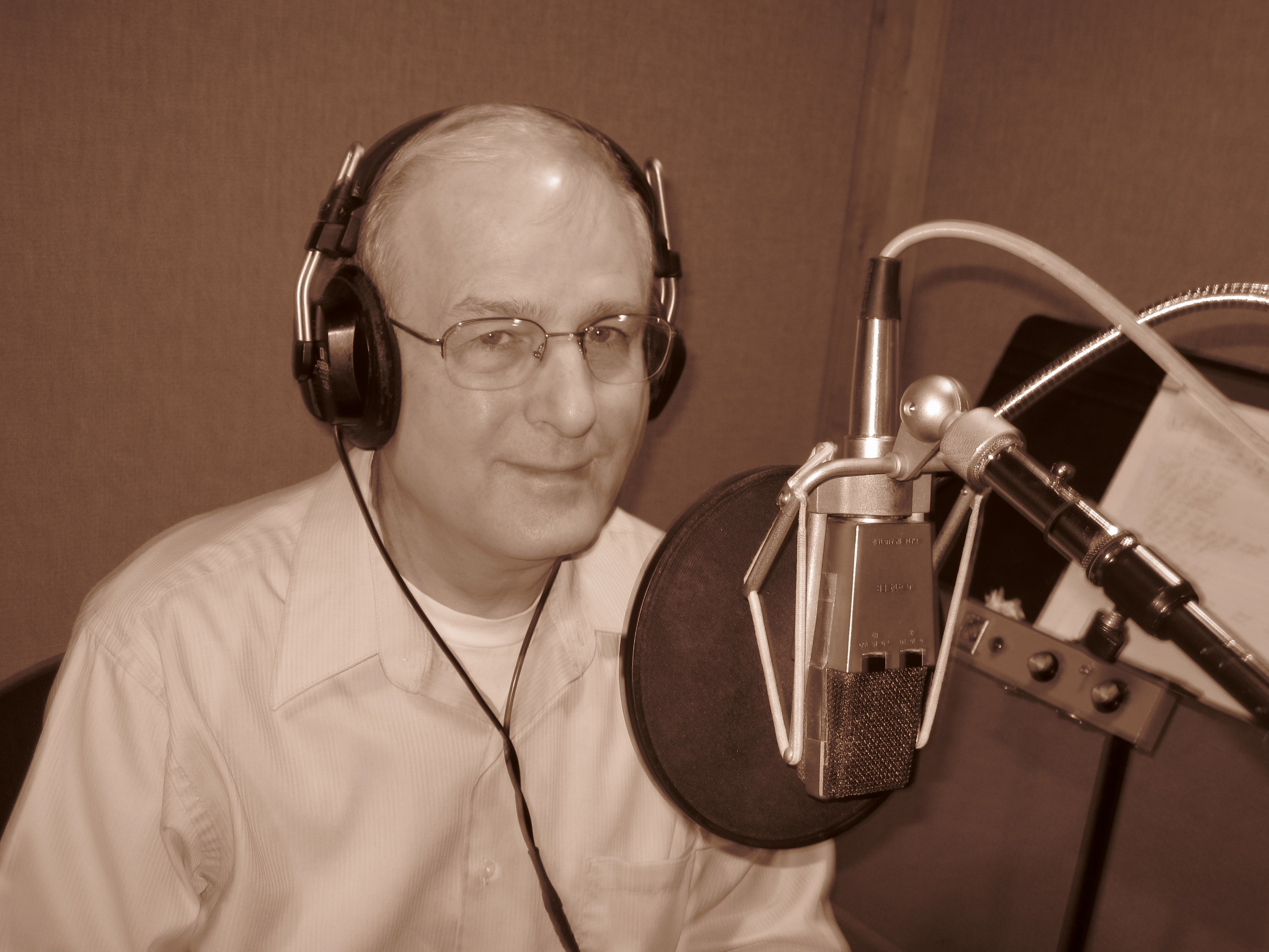James Mastbrook at radio microphone